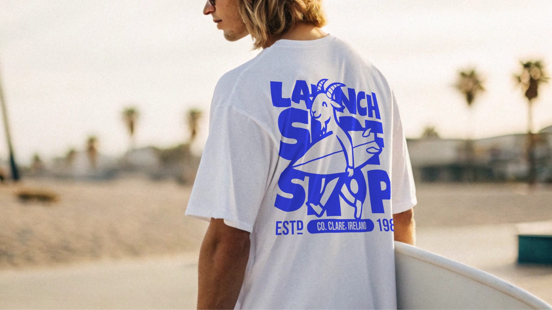 young surfer wearing my Lahinch Surf Shop tee