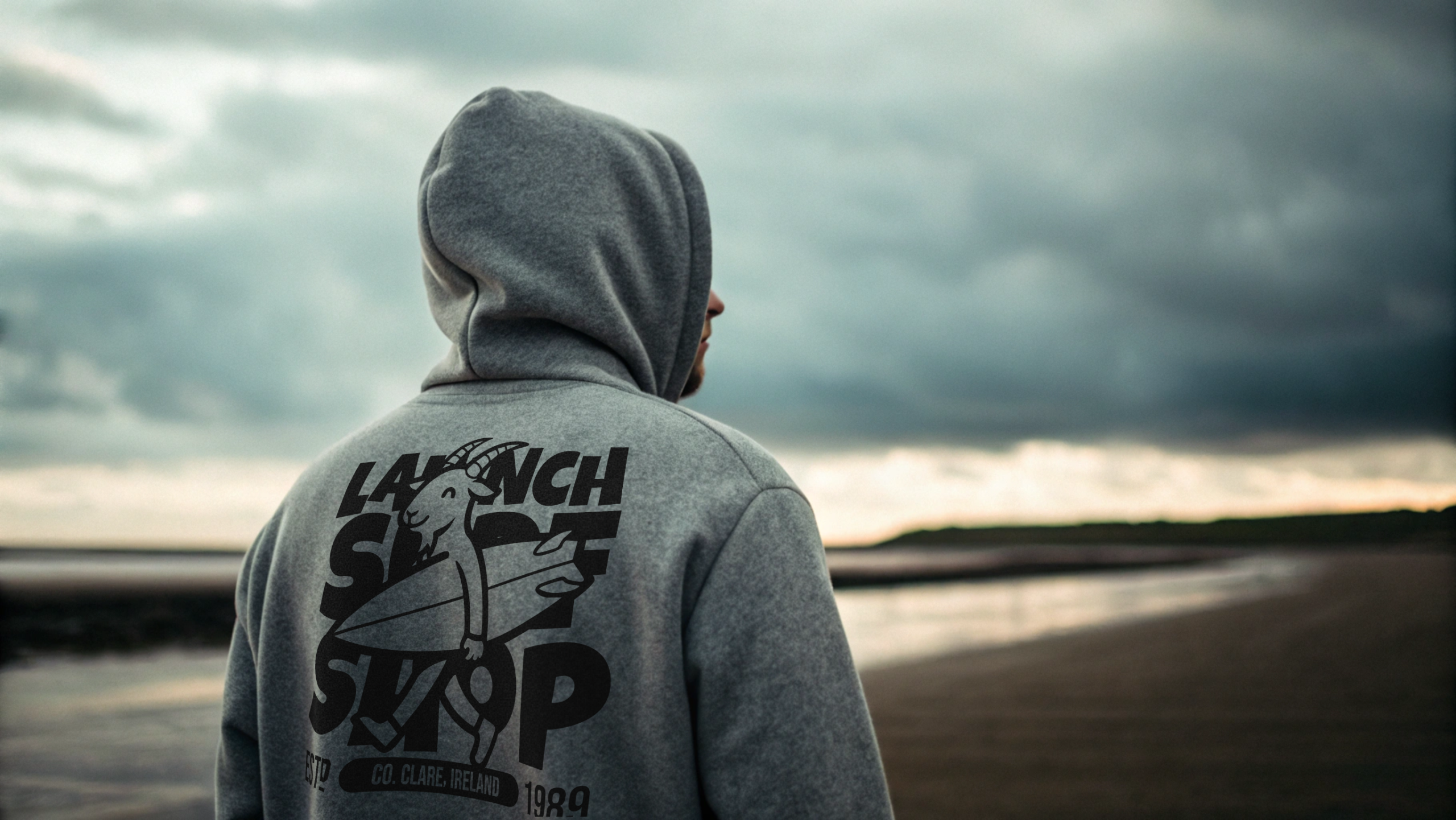 young surfer wearing my Lahinch Surf Shop tee